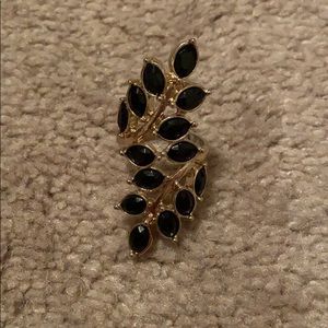 Gold ring of black leaves
